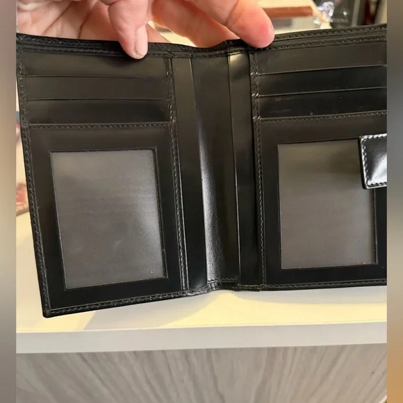 Salvatore Ferragamo Gancini Black Embossed Bifold Leather Wallet